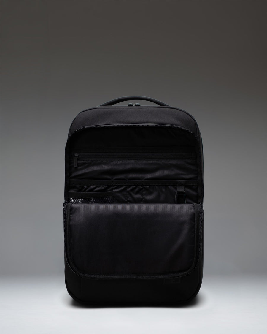 Herschel Supply Co. Kaslo Daypack Tech in black, showing a sleek, modern backpack design perfect for daily commutes and tech storage.