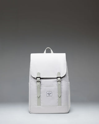 Herschel Retreat Small Backpack in Metal, front view showing the classic design with dual strap closures and a woven label.