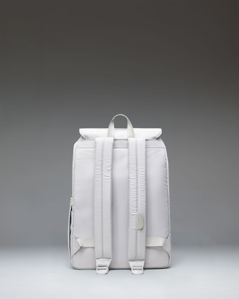 Herschel Retreat Small Backpack in Metal color, showing the clean design, front strap details, and classic woven label.