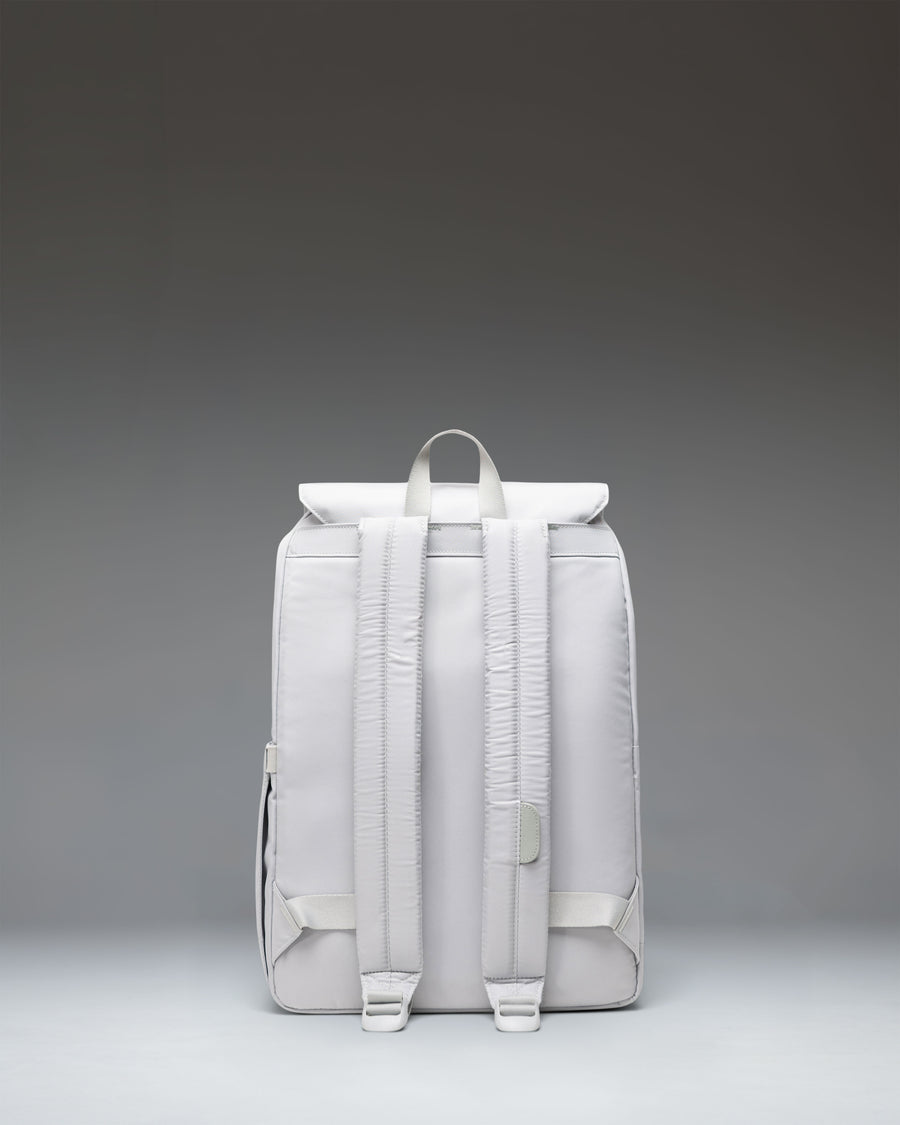 Herschel Retreat Small Backpack in Metal color, showing the clean design, front strap details, and classic woven label.