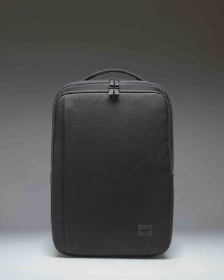 Herschel Supply Co. Kaslo Travel Backpack Tech in black. Clean front view showcasing the durable material and zippered compartments.