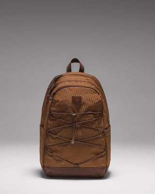 Herschel Kingston Backpack in Soft Silt Diamond and Chicory Coffee brown, showing the front view with pocket and brand logo.