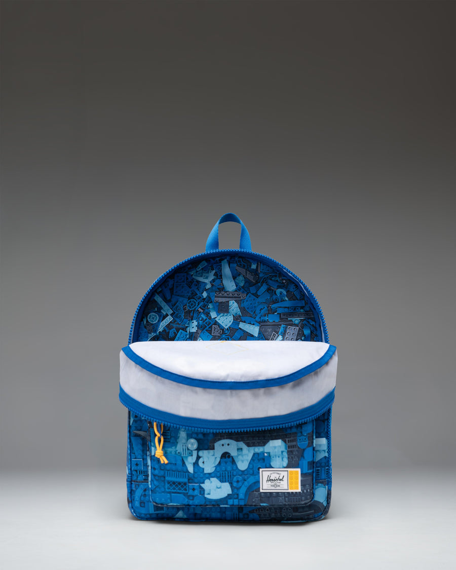 LEGO Herschel Heritage Kids Backpack in Abstract Bricks Blue, featuring a colorful LEGO brick pattern.