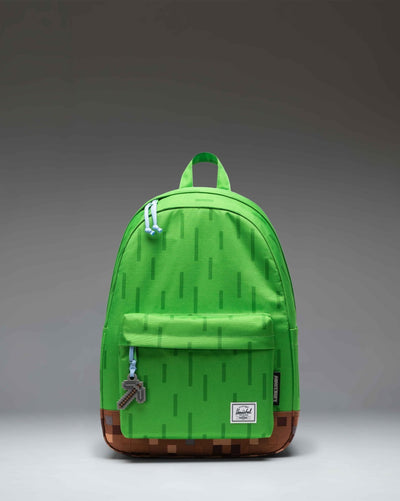 Herschel Supply Co. x Minecraft Classic Backpack in The Overworld colorway, featuring iconic pixelated block prints from the game.