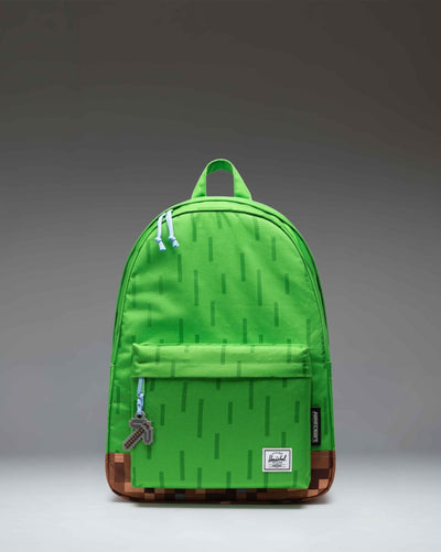 Herschel Supply Co. Minecraft Classic XL Backpack in The Overworld print, featuring a pixelated green and brown grass block design.