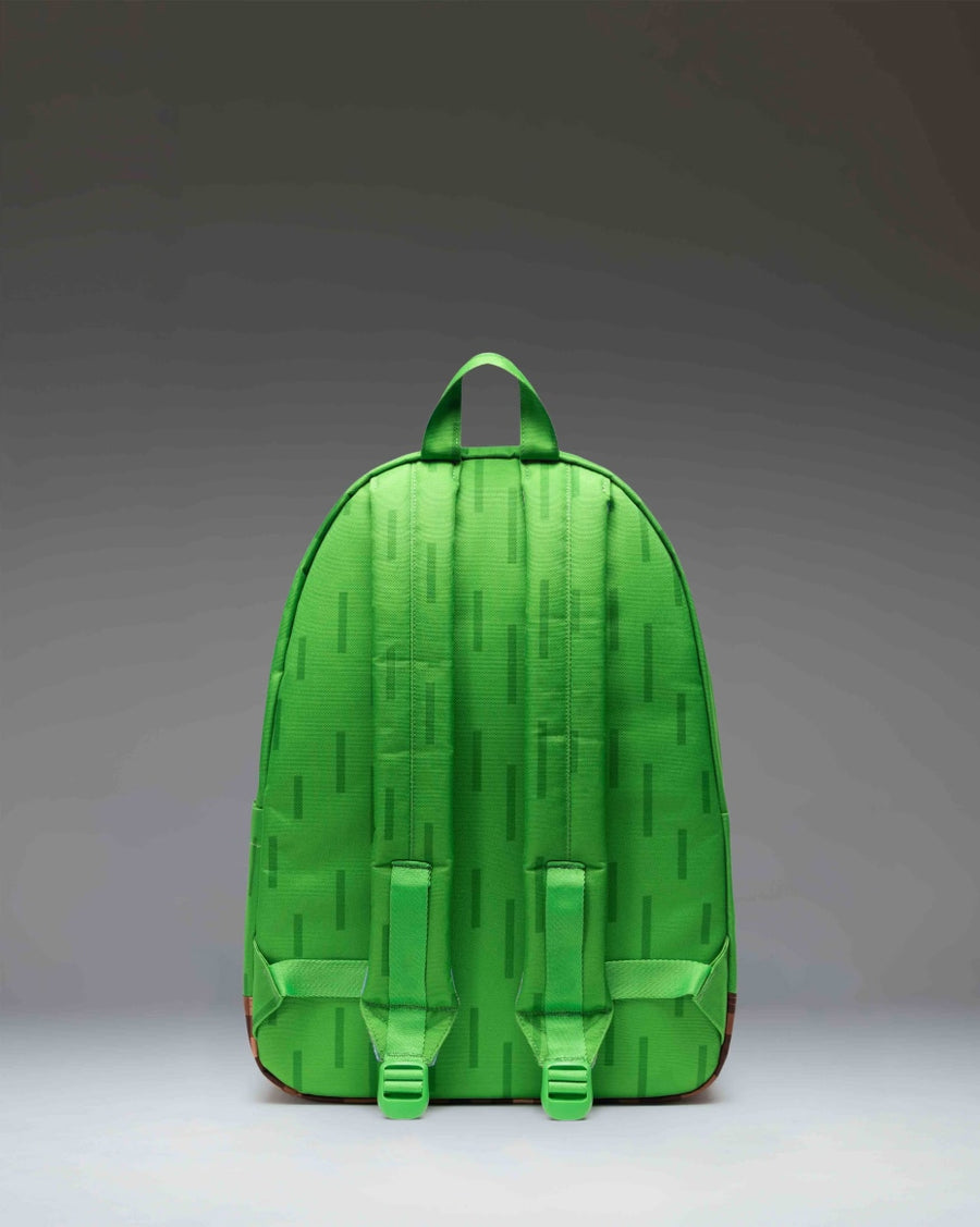 Minecraft Herschel Classic XL Backpack in The Overworld colorway, featuring pixelated landscape prints from the game.