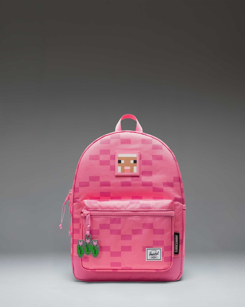 Herschel Supply Co. Minecraft Heritage Kids Backpack in Pink Sheep, featuring a pixelated pink sheep design.