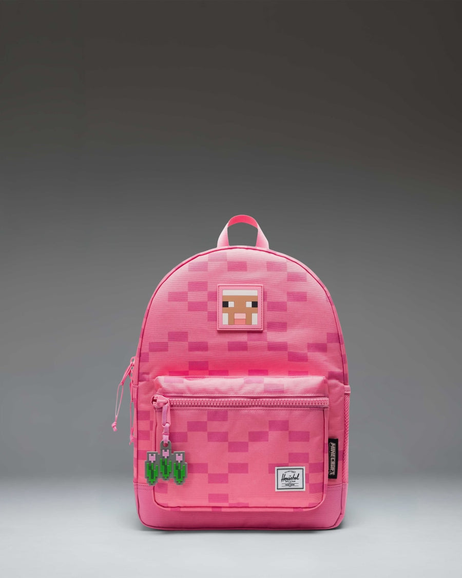 Herschel Supply Co. Minecraft Heritage Kids Backpack in Pink Sheep, featuring a pixelated pink sheep design.