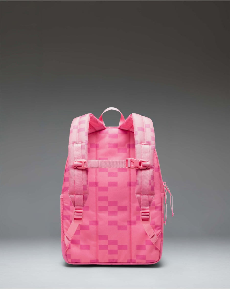 Minecraft Herschel Heritage Kids Backpack in Pink Sheep, featuring a pixelated pink design inspired by the game, shown from the front.