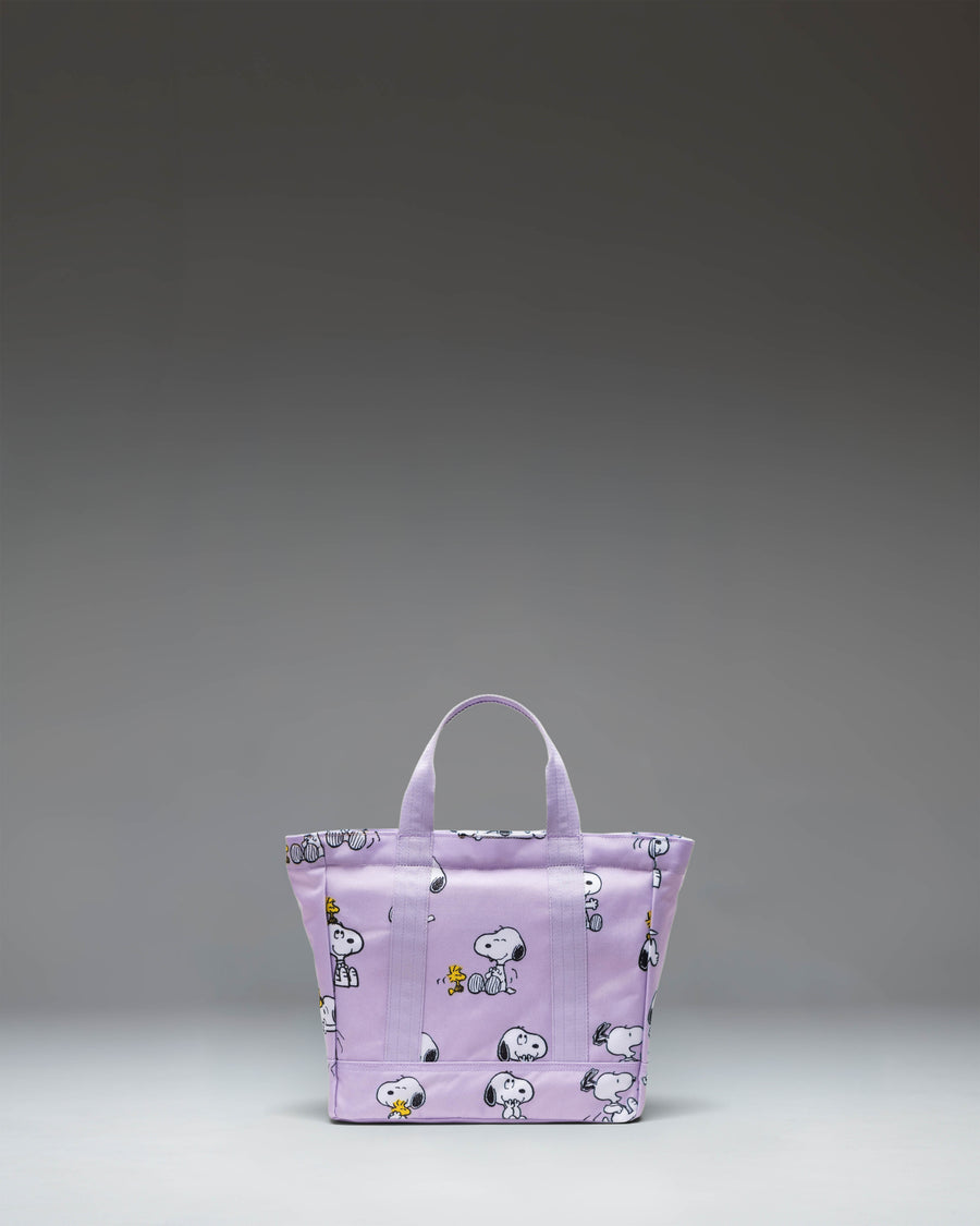 Herschel Supply Co. Peanuts Herschel Heritage Small Tote in Snoopy and Woodstock Pastel Lilac showing its storage space.