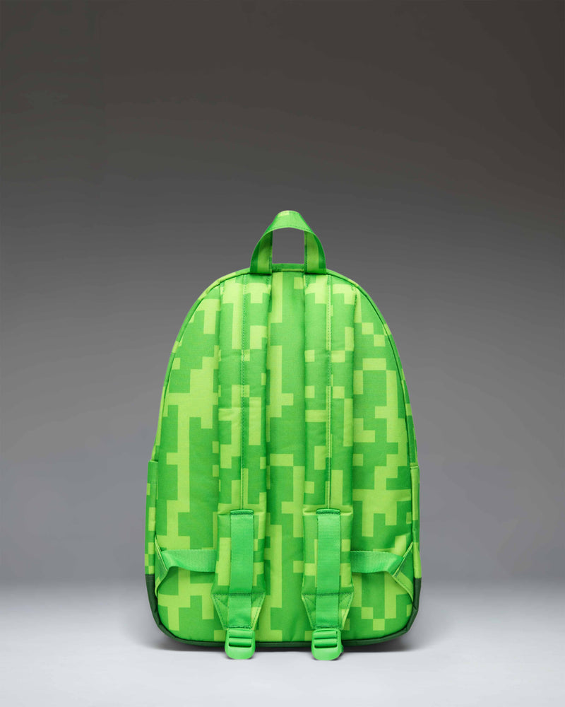 Herschel Supply Co. Minecraft Heritage Youth Backpack in the green and pixelated Creeper colorway pattern.