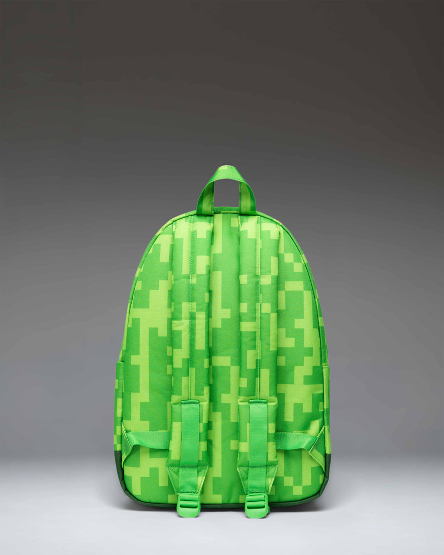 Herschel Supply Co. Minecraft Heritage Youth Backpack in the green and pixelated Creeper colorway pattern.