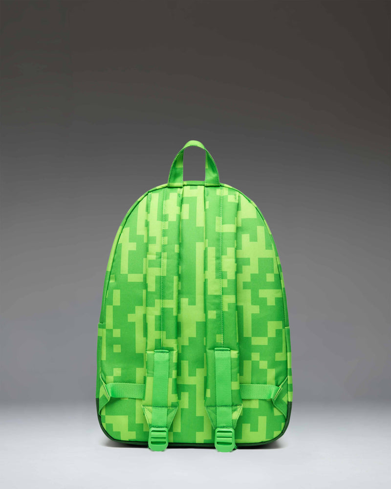 Herschel Supply Co. Minecraft Heritage Youth Backpack in the green pixelated Creeper colorway.