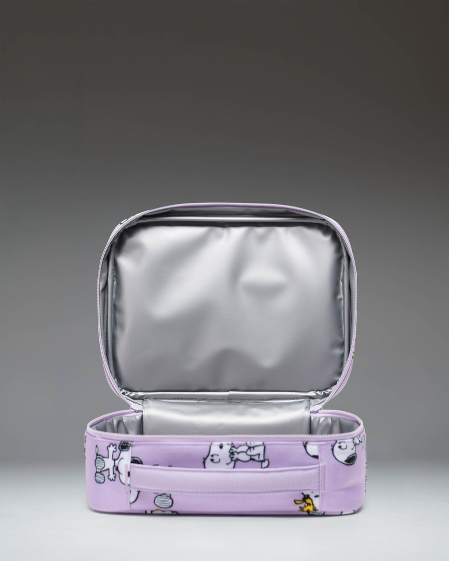 Herschel Supply Co. Peanuts Pop Quiz Lunch Box in Snoopy and Woodstock Pastel Lilac showing a side view.