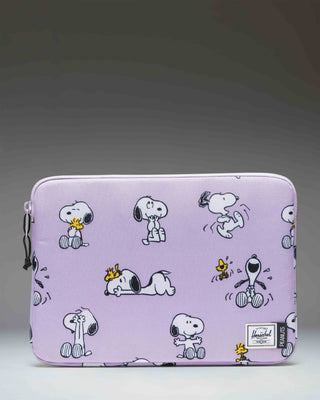 Herschel Supply Co. Peanuts Anchor 14 Inch Laptop Sleeve in Snoopy and Woodstock Pastel Lilac, front view.