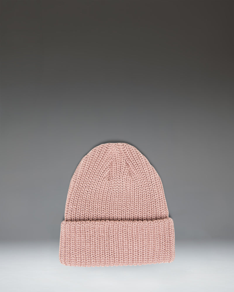 Herschel Supply Co Douglas Beanie in Ash Rose, a soft pink knit beanie featuring a folded cuff with a classic woven logo label.