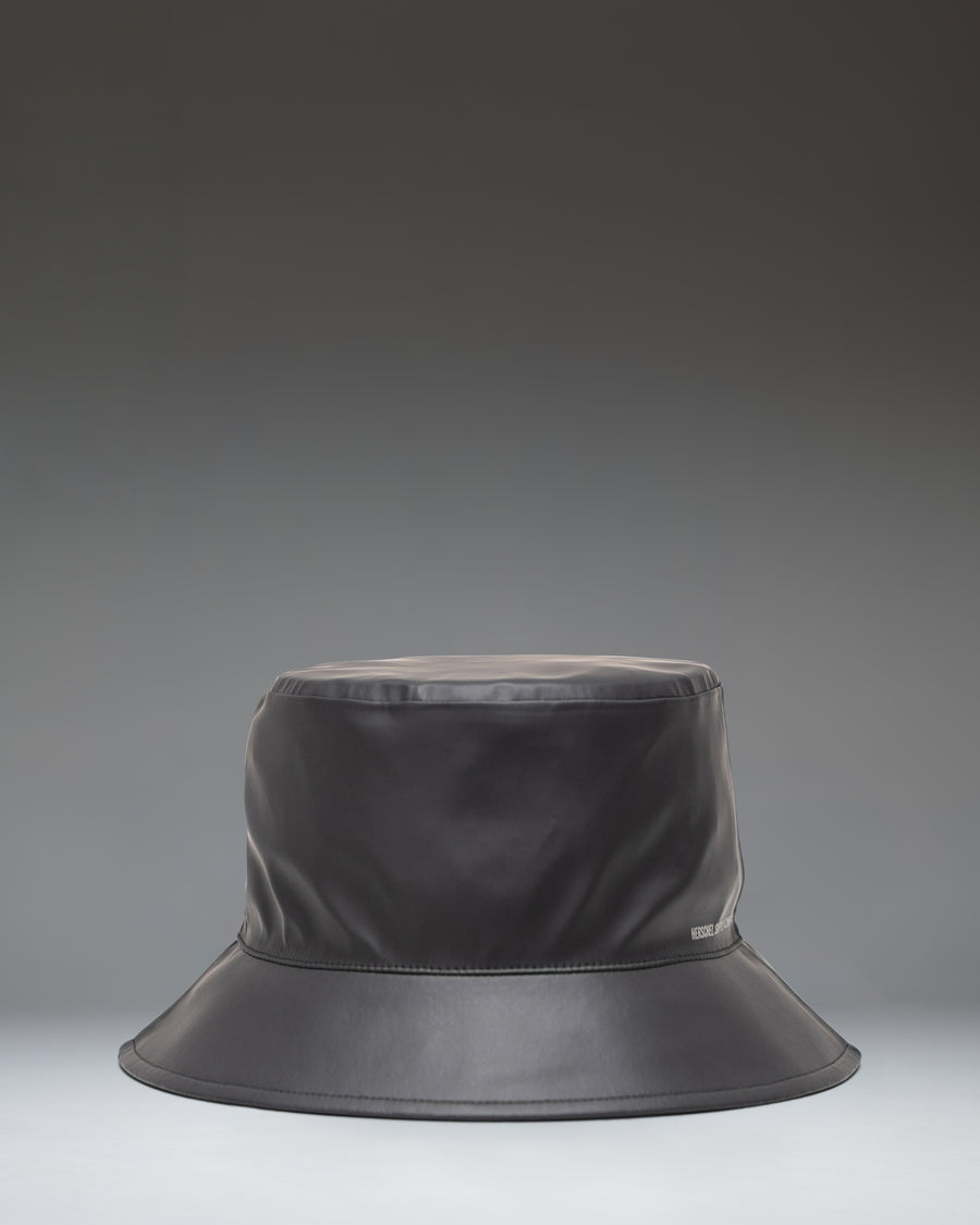 Herschel Supply Co. Norman Rain Bucket Hat in Black size guide chart showing measurements for all available sizes.