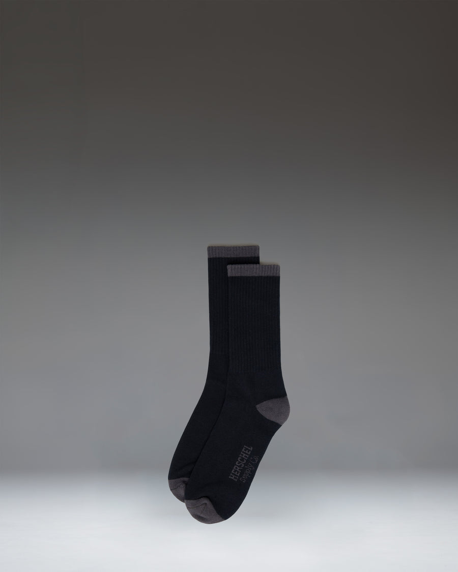 Herschel Supply Co. Classic Fit Crew Sock in Black Tonal, showing the classic ribbed design and comfortable fit.