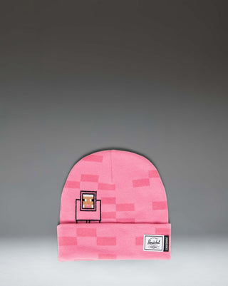 Herschel Supply Co. Minecraft Elmer Beanie in Pink Sheep, featuring a pixelated pink knit design with a folded cuff and a Minecraft logo patch.