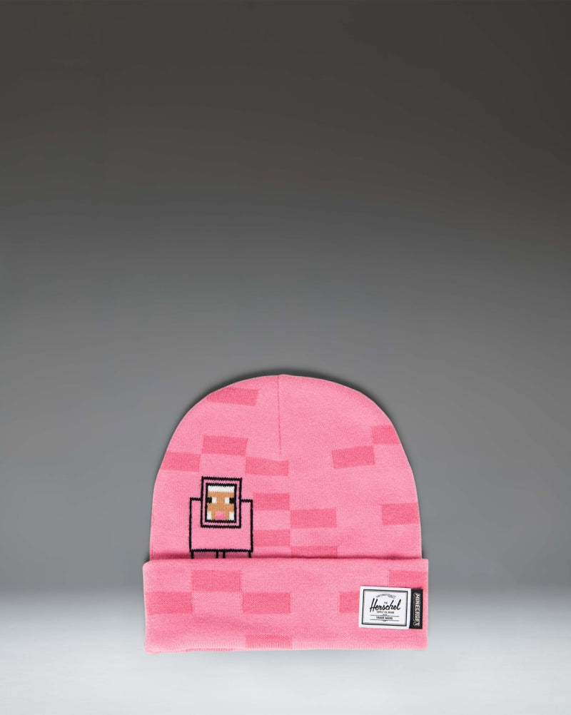 Herschel Supply Co. Minecraft Elmer Beanie in Pink Sheep, featuring a pixelated pink knit design with a folded cuff and a Minecraft logo patch.