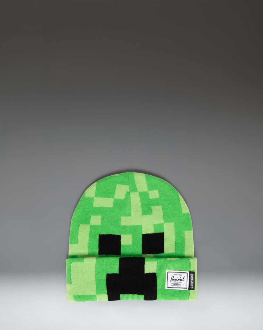 Herschel Supply Co. Minecraft Elmer Kids Beanie in Creeper green, featuring a pixelated Minecraft design with a folded cuff and classic woven label.