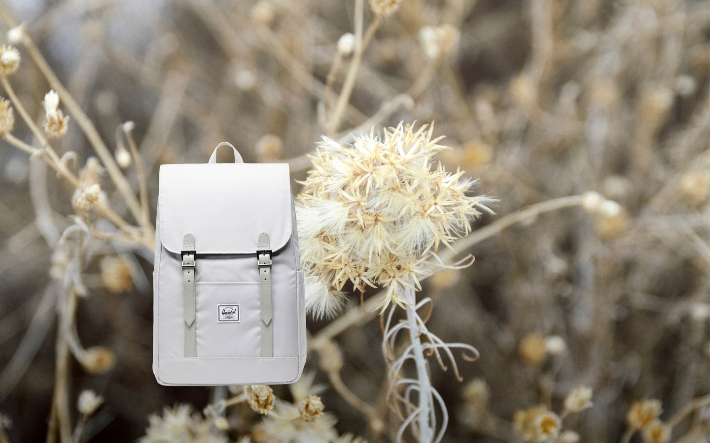 Herschel Retreat Small Backpack in Metal color shown from the front against a neutral background.