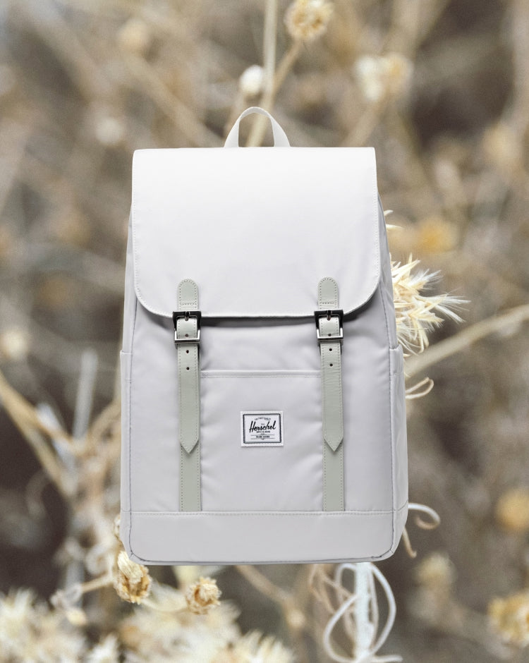 Herschel Retreat Small Backpack in Metal gray, shown on a mobile device view.