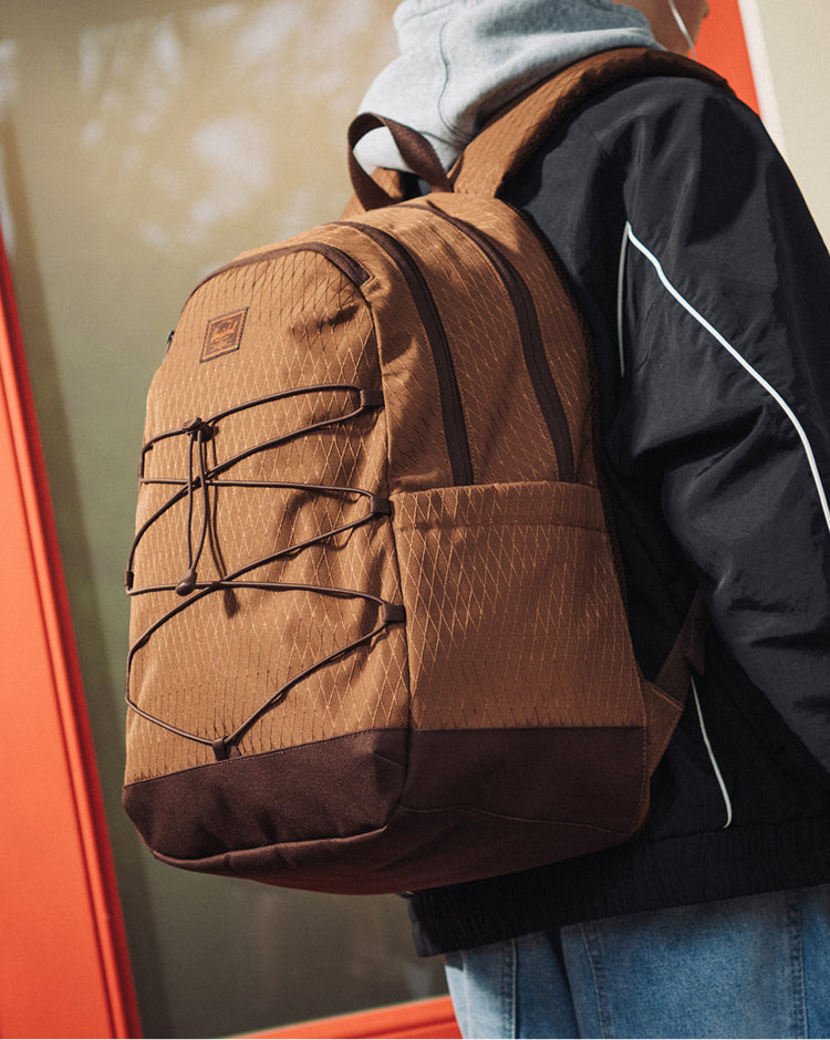 Herschel Kingston Backpack in Soft Silt Diamond and Chicory Coffee brown.
