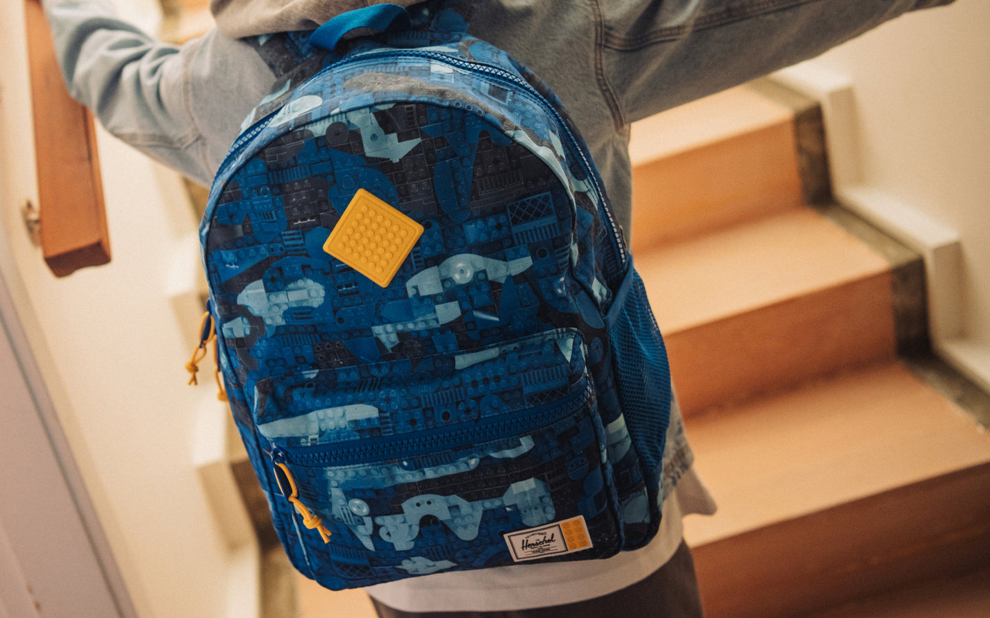 Herschel Supply Co. LEGO Heritage Kids Backpack in Abstract Bricks Blue, shown from the front.