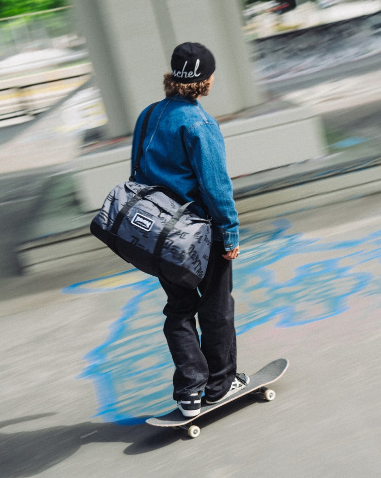 Herschel Supply Co. Thrasher Heritage Skate Duffle Nylon bag in Asphalt/Black Destroy colorway.
