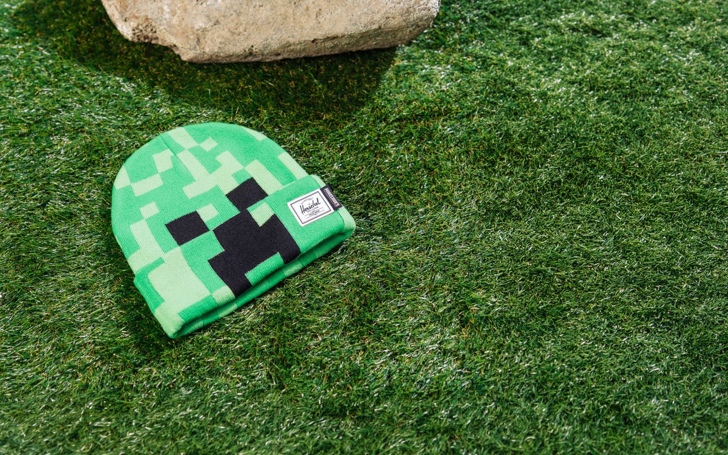Kids Minecraft Elmer Beanie by Herschel Supply Co in Creeper green and black pixels.